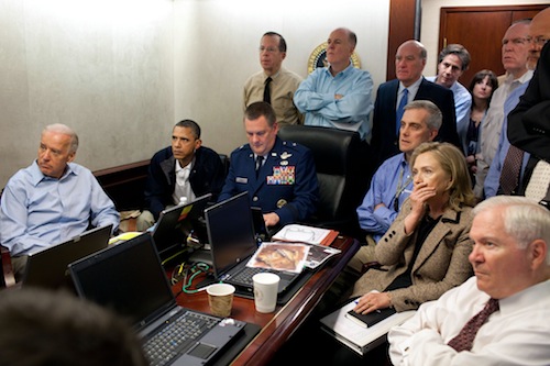 President Barack Obama and Vice President Joe Biden, along with with members of the national security team, receive an update on the mission against Osama bin Laden in the Situation Room of the White House, May 1, 2011.