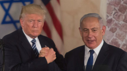 US President Donald Trump (L) and Israel's Prime Minister Benjamin Netanyahu shake hands after delivering a speech during a visit to the Israel Museum on May 23, 2017 in Jerusalem, Israel.