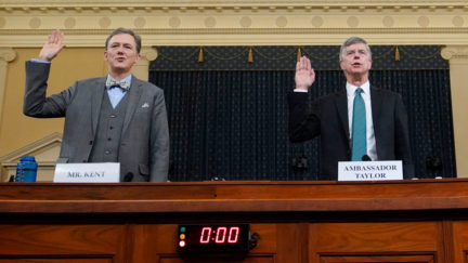 Deputy Assistant Secretary for European and Eurasian Affairs George P. Kent and top U.S. diplomat in Ukraine William B. Taylor Jr. are sworn-in prior to testifying before the House Intelligence Committee on Capitol Hill November 13, 2019 in Washington, DC.