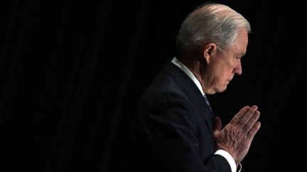 Jeff Sessions listens as he is introduced during the Justice Department's Executive Officer for Immigration Review Annual Legal Training Program June 11, 2018 in Tysons, Virginia.