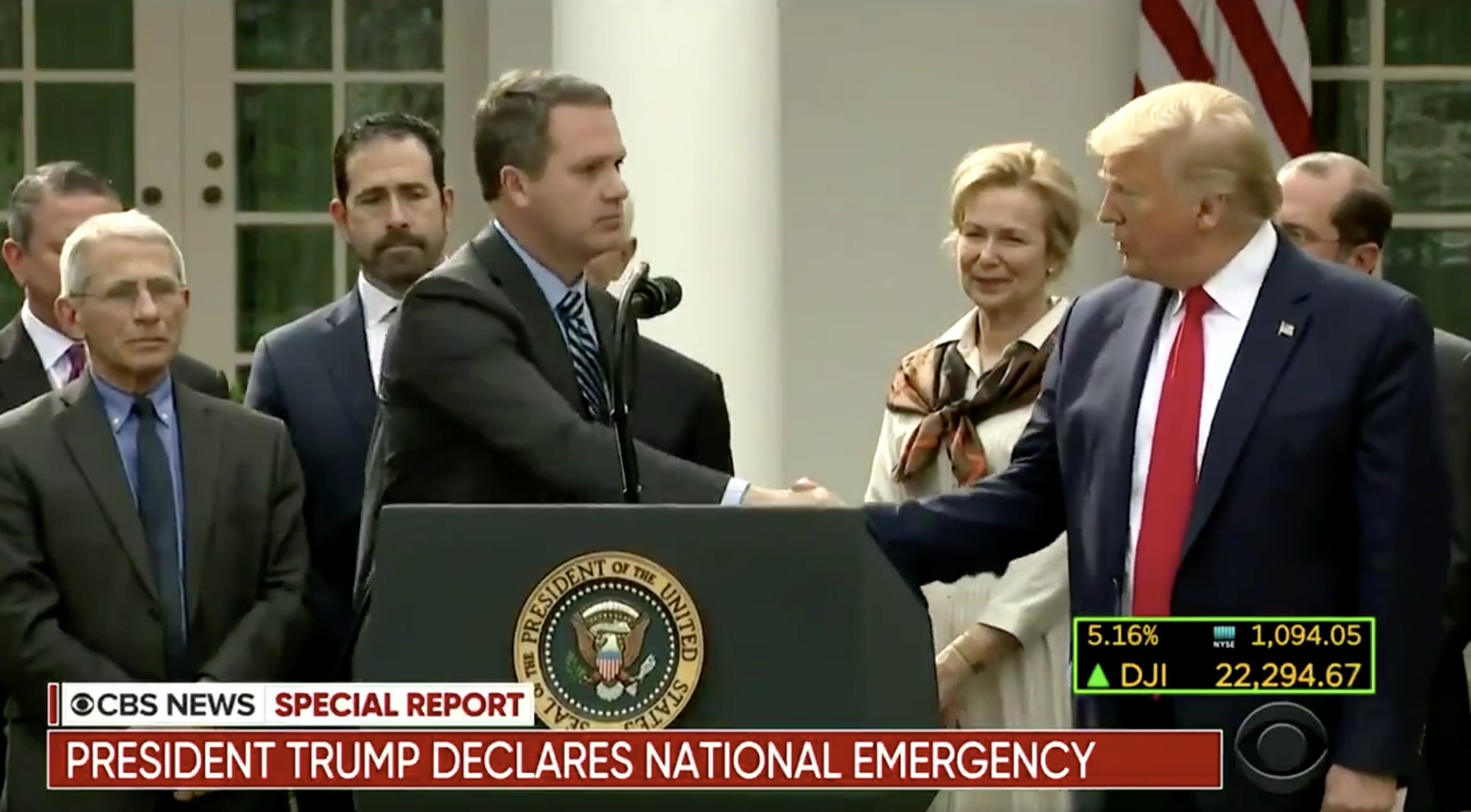 Trump shaking hands at press conference