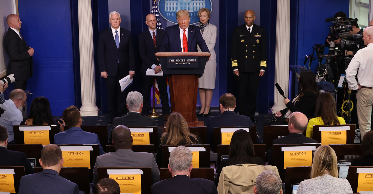 U.S. President Donald Trump talks to reporters with members of the White House Coronavirus Task Force