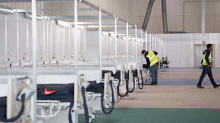 Soldiers and private contractors help to prepare the ExCel centre which is being made into the temporary NHS Nightingale hospital, comprising of two wards, each of 2,000 people, to help tackle coronavirus on March 30, 2020 in London, England.