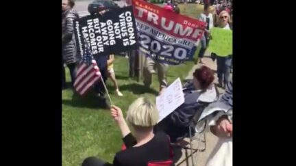 Trump Retweets Long Island Protestors Berating Reporter as 'Fake News'