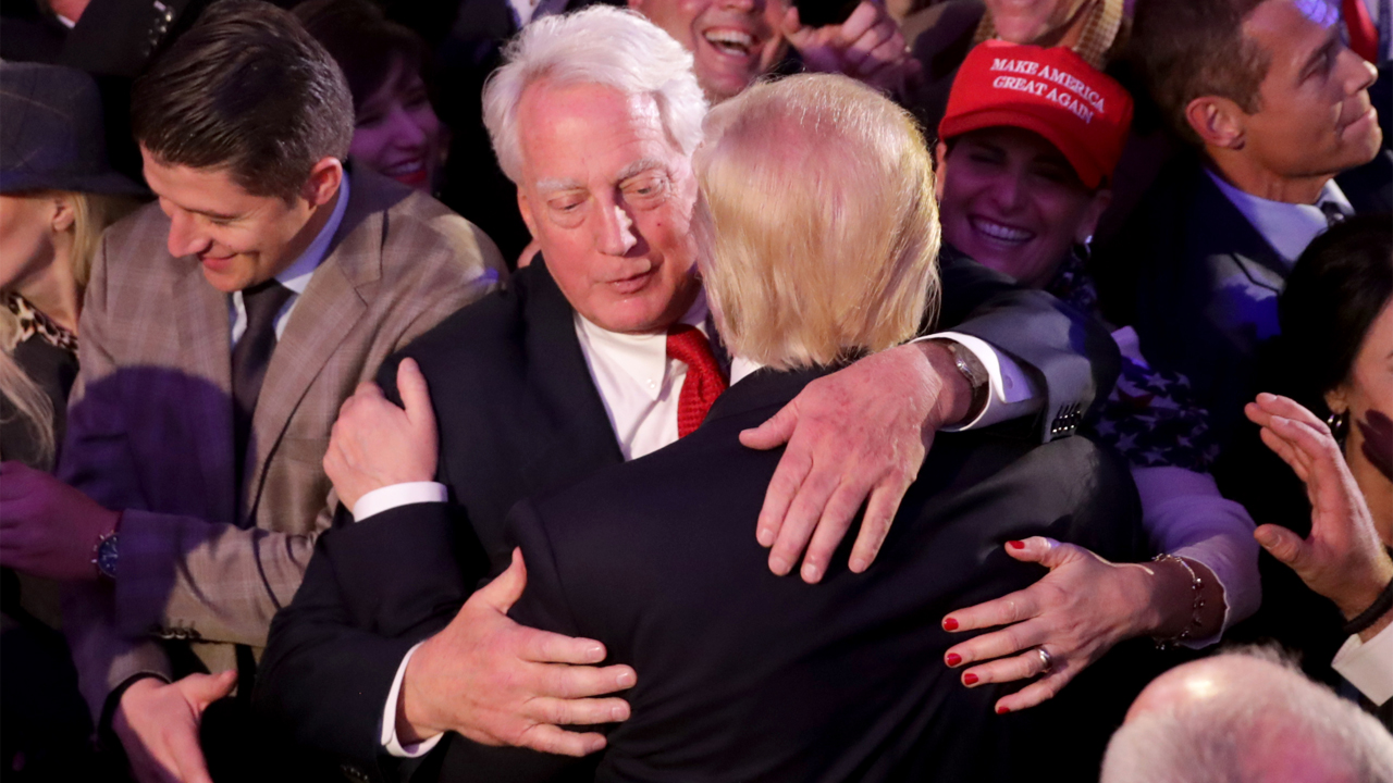 Donald Trump hugs his brother Robert Trump