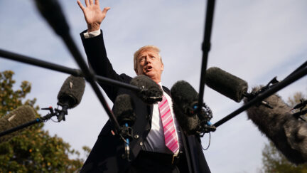 Donald Trump speaking with reporters