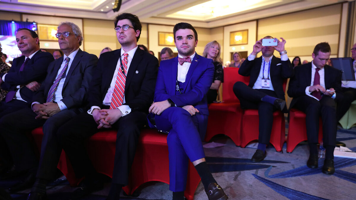 Conservative listen to former President Donald Trump at CPAC 2021, titled America Uncanceled