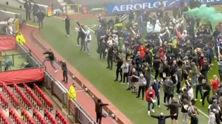Manchester United supporters storm Old Trafford Pitch