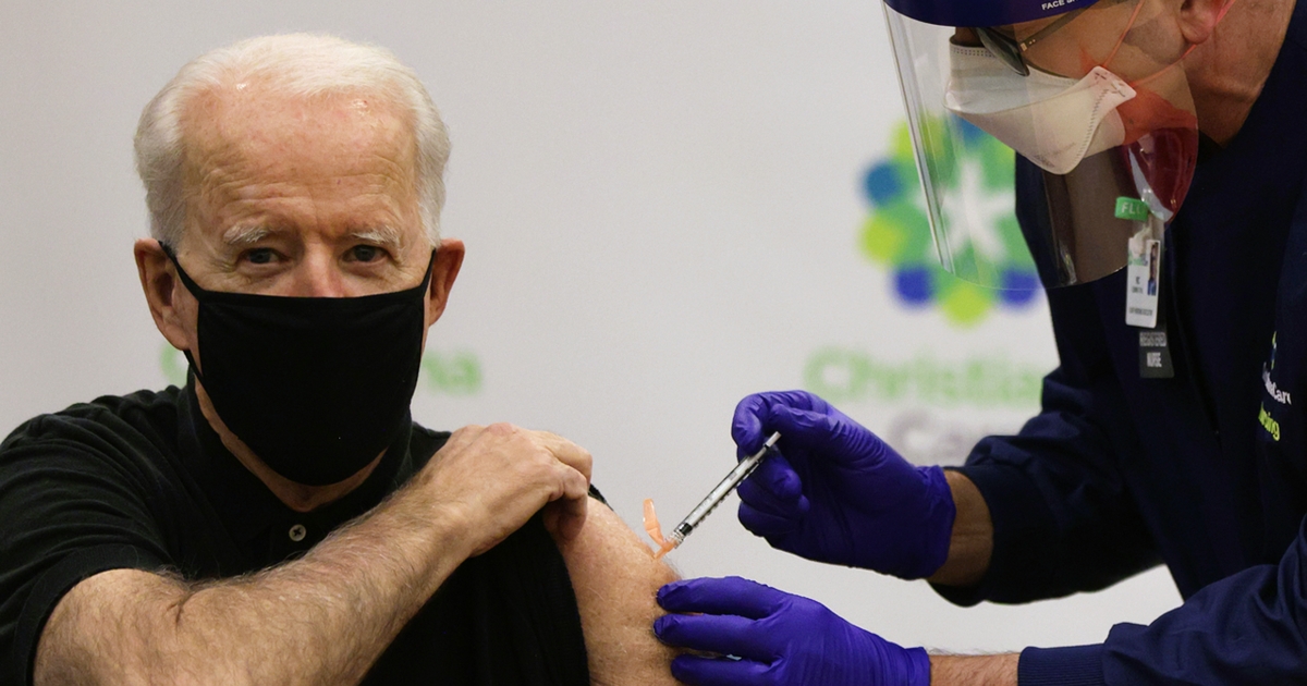 WILMINGTON, DELAWARE - JANUARY 11: President-elect Joe Biden receives the second dose of the Pfizer/BioNTech COVID-19 vaccination from Chief Nurse Executive Ric Cuming at ChristianaCare Christiana Hospital on January 11, 2021 in Newark, Delaware. Biden received the second dose of the coronavirus vaccine three weeks after his first dose, received a few days before Christmas.