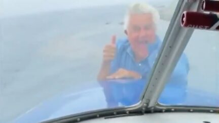 Jay Leno Climbs Out of PLane
