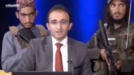 armed Taliban behind Afghan news anchor