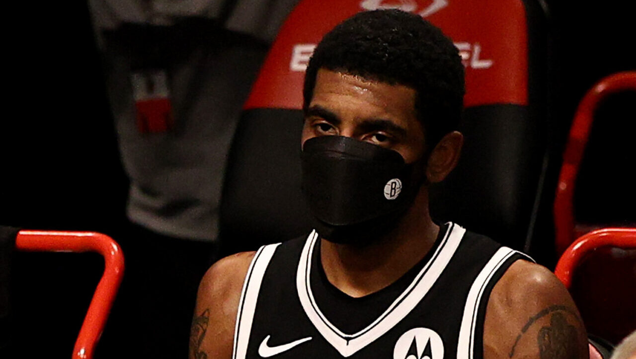 Nets' Kyrie Irving is back along with the mask he despises