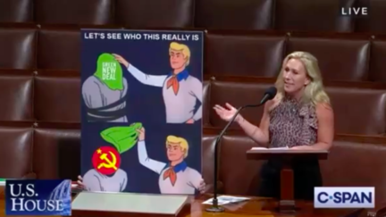 Marjorie Taylor Greene presents a Scooby Doo meme on the House floor
