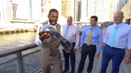 Randy Moss measures risk from Tom Brady's infamous Lombardi Trophy toss