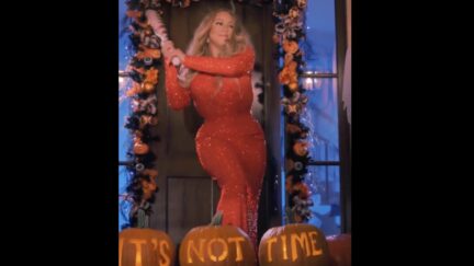 mariah carey smashes a pumpkin and now it's Christmas time