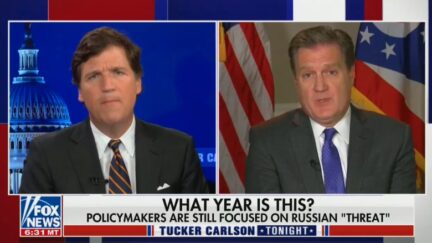 Tucker Carlson arguing with Mike Turner