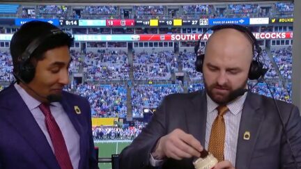 Mike Golic Jr. eating an Oreo with mayo