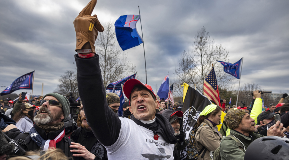 Trump supporters clash with police and security forces as people try to storm the US Capitol in Washington D.C on January 6, 2021.