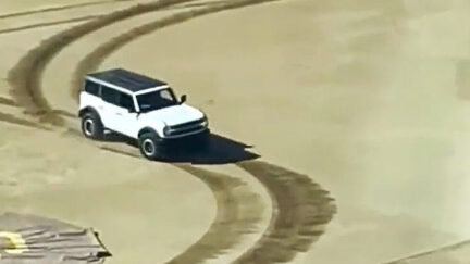 Driver tears up MLB field with his SUV