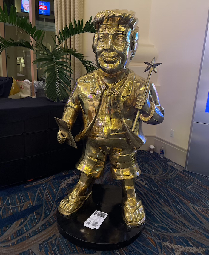 trump golden statue at CPAC