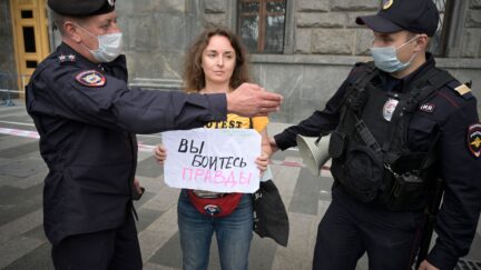 Russian protesting suppression of media freedom