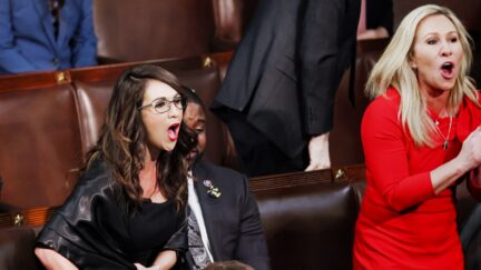 WASHINGTON, DC - MARCH 01: U.S. Rep. Lauren Boebert (R-CO) and Rep. Marjorie Taylor Greene (R-GA) scream 