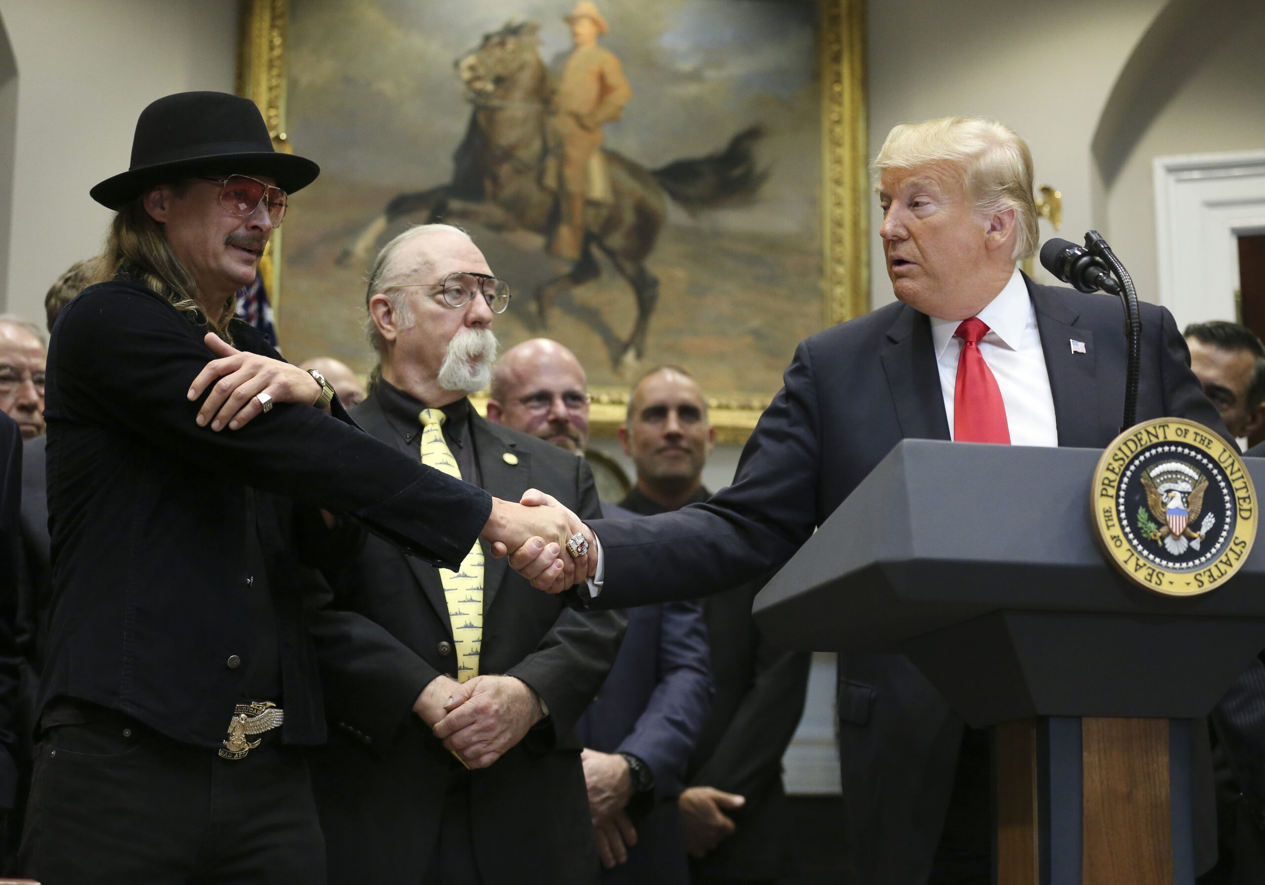 Kid Rock shakes hands with Donald Trump in 2018
