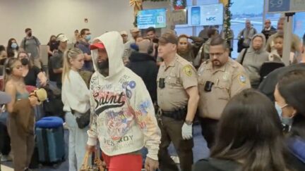 Odell Beckham Jr. being escorted off plane in Miami