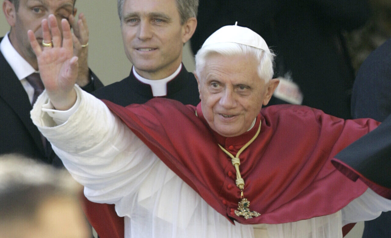 FILE - Pope Benedict XVI greets the faithful in front of the Old Chapell in Regensburg, southern Germany, Sept. 13, 2006.
