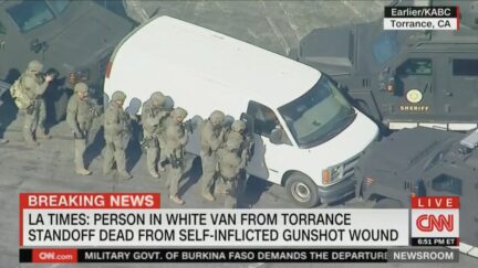 SWAT team approaching white van