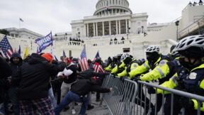 Capitol Police attempt to hold back rioters on Jan. 6, 2021