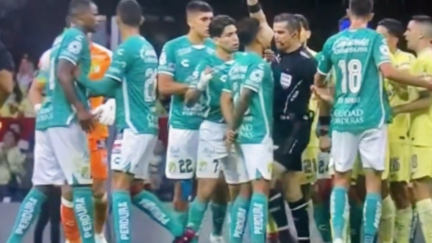Fernando Hernandez kneeing Lucas Romero
