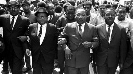 FILE - The Rev. Ralph Abernathy, right, and Bishop Julian Smith, left, flank Dr. Martin Luther King, Jr., during a civil rights march in Memphis, Tenn., March 28, 1968. Two young Black Tennessee state legislator Justin Pearson and Justin Jones — now widely known simply as 