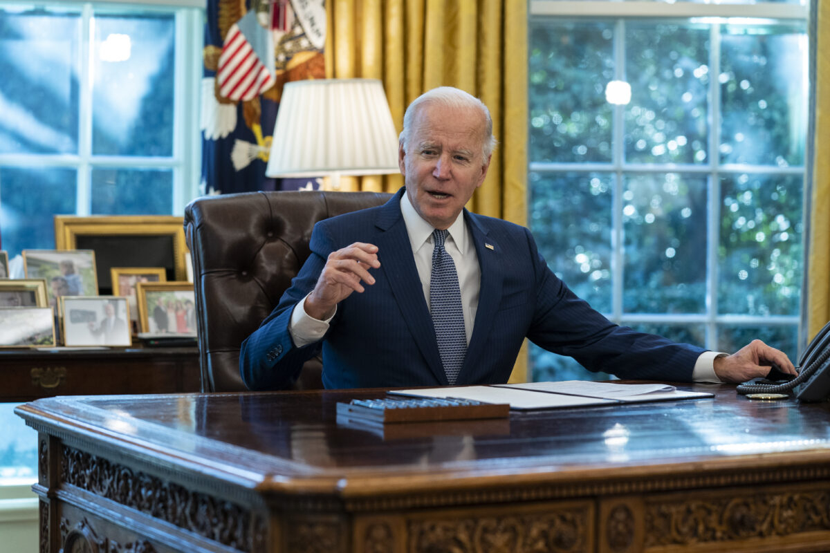 Joe Biden at desk in Oval Office
