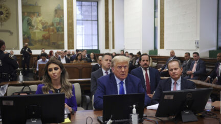 Former President Donald Trump sits in the courtroom with his legal team before the continuation of his civil business fraud trial at the New York Supreme Court, Tuesday, Oct. 24, 2023, in New York.