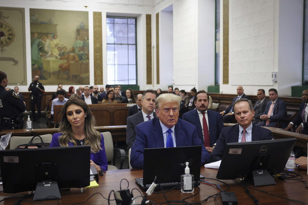 Former President Donald Trump sits in the courtroom with his legal team before the continuation of his civil business fraud trial at the New York Supreme Court, Tuesday, Oct. 24, 2023, in New York. 