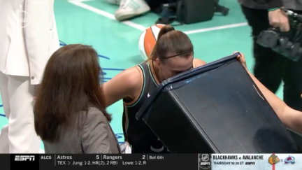 New York Liberty guard Sabrina Ionescu throws up during WNBA Finals game