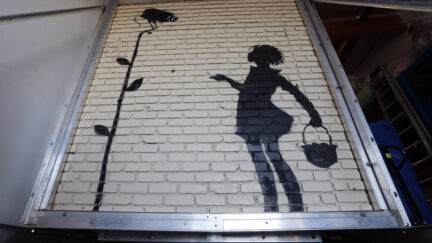 Banksy Flower Girl mural