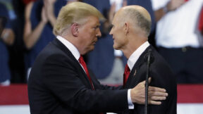 Donald Trump hugs Rick Scott