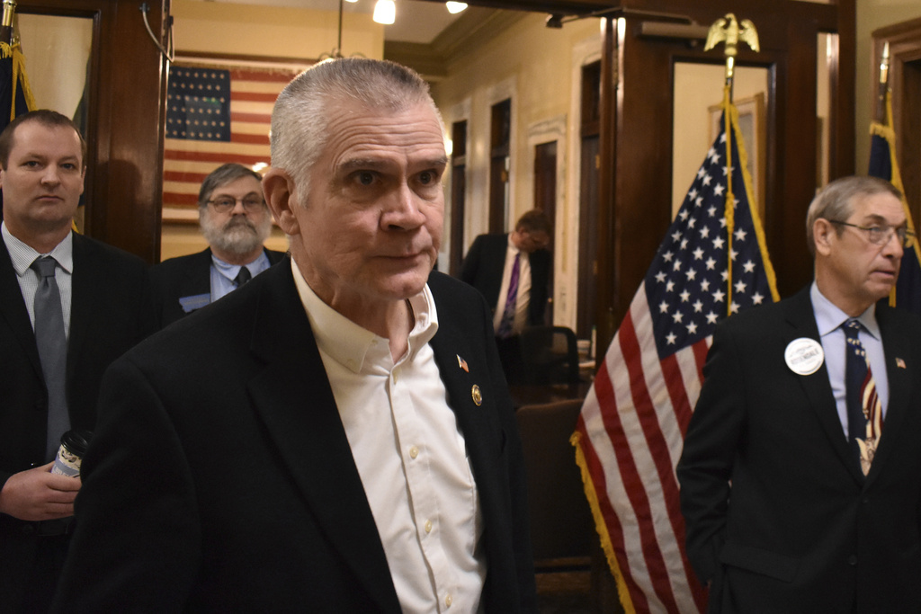 Republican Rep. Matt Rosendale leaves the Montana Secretary of State's office after filing paperwork to run for U.S. Senate, Friday, Feb. 9, 2024, at the state capitol in Helena, Mont. Rosendale is entering the race after GOP leaders in the senate had discouraged him from running.