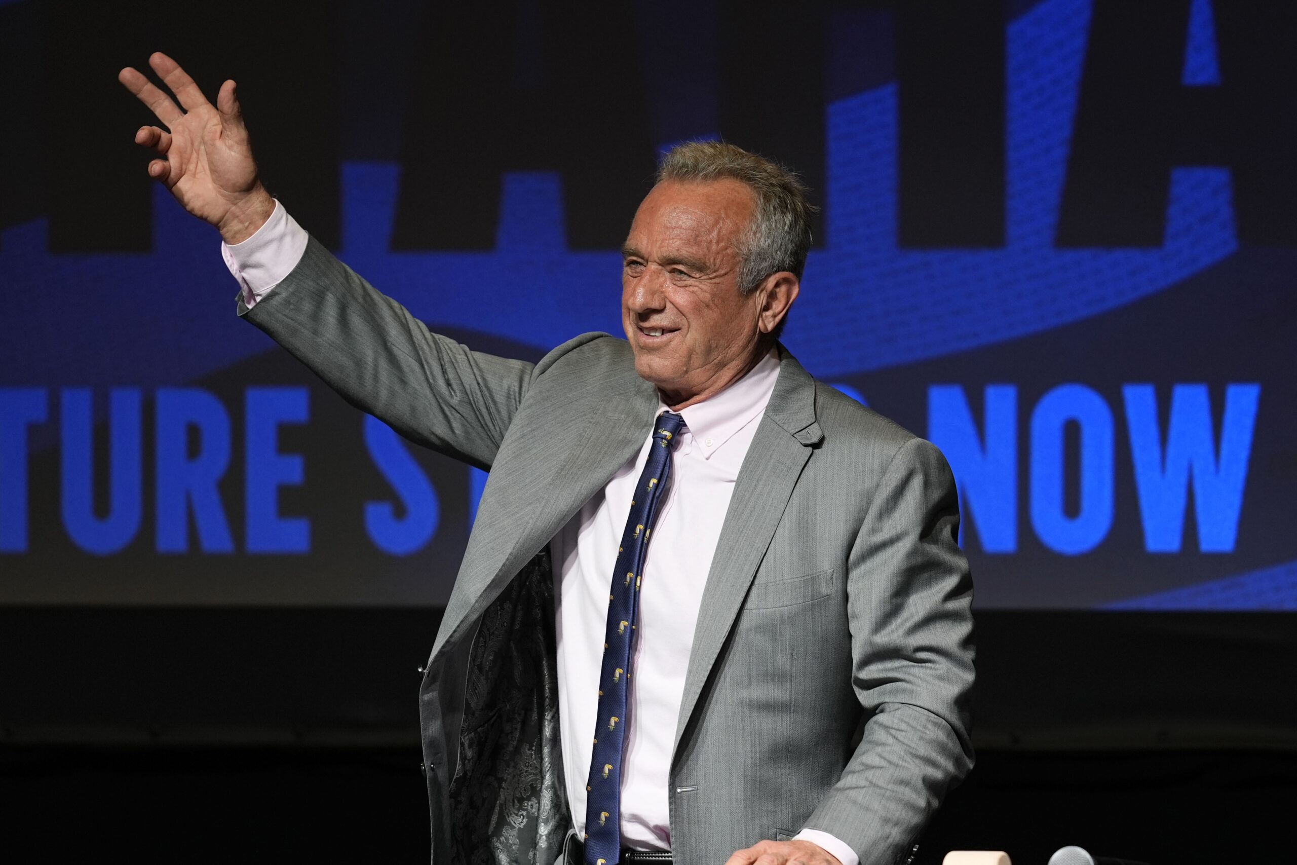 Independent presidential candidate Robert F. Kennedy Jr. waves to supporters during a campaign event, Saturday, April 13, 2024, in West Des Moines, Iowa.