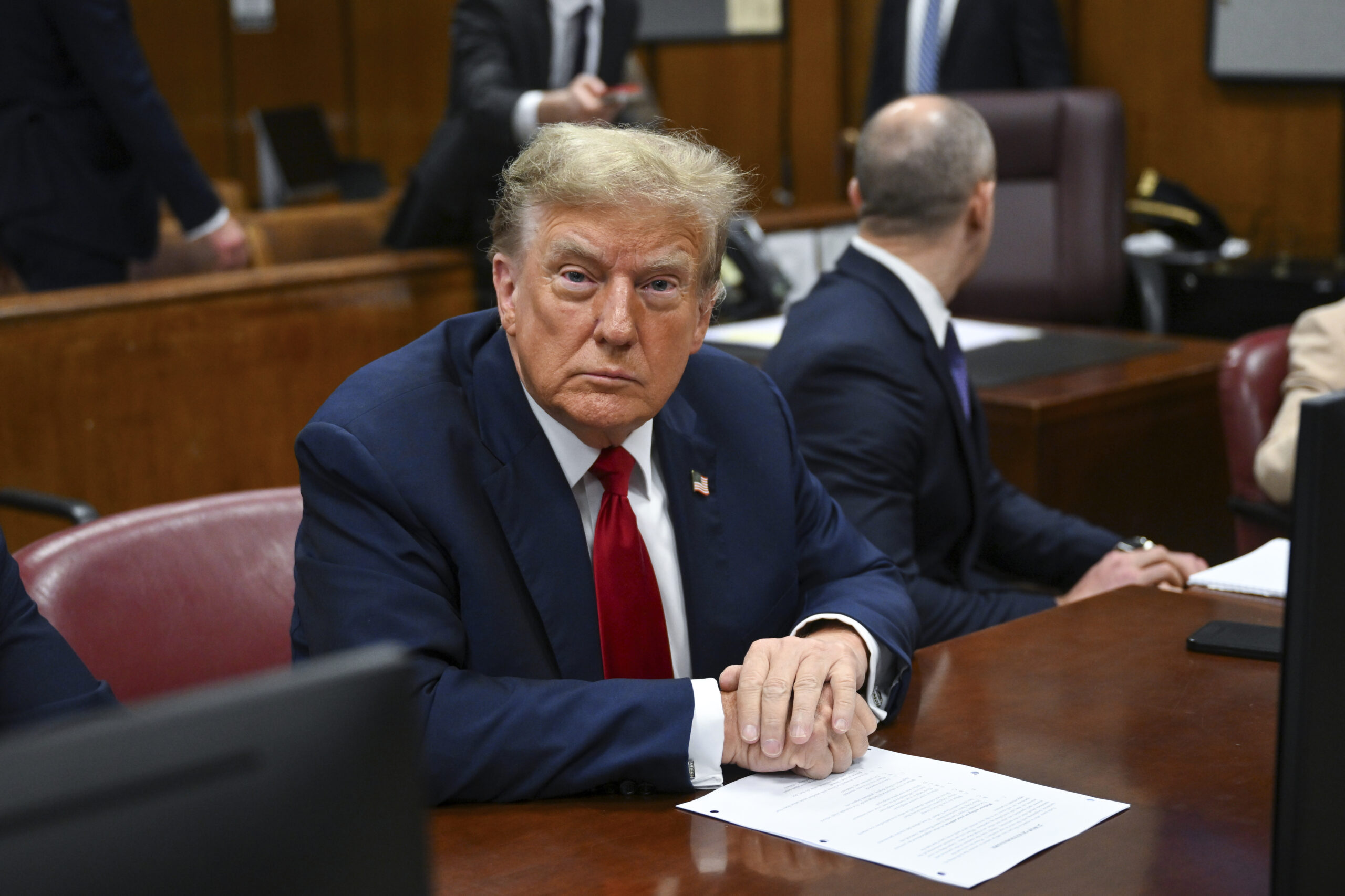 Former President Donald Trump attends the first day of his trial at Manhattan Criminal Court in New York City.