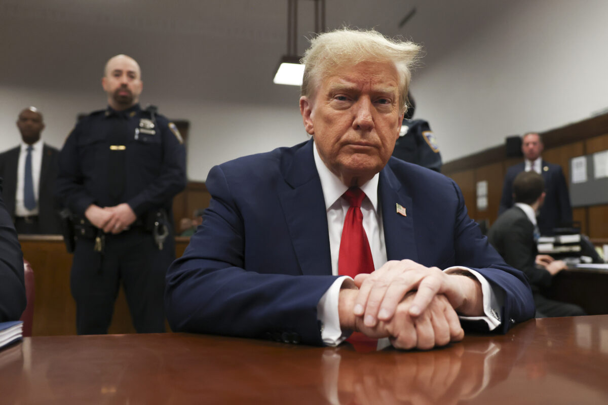 Former president Donald Trump waits for the start of proceedings in Manhattan criminal court, Tuesday, April 23, 2024, in New York. Before testimony resumes Tuesday, the judge will hold a hearing on prosecutors' request to sanction and fine Trump over social media posts they say violate a gag order prohibiting him from attacking key witnesses.
