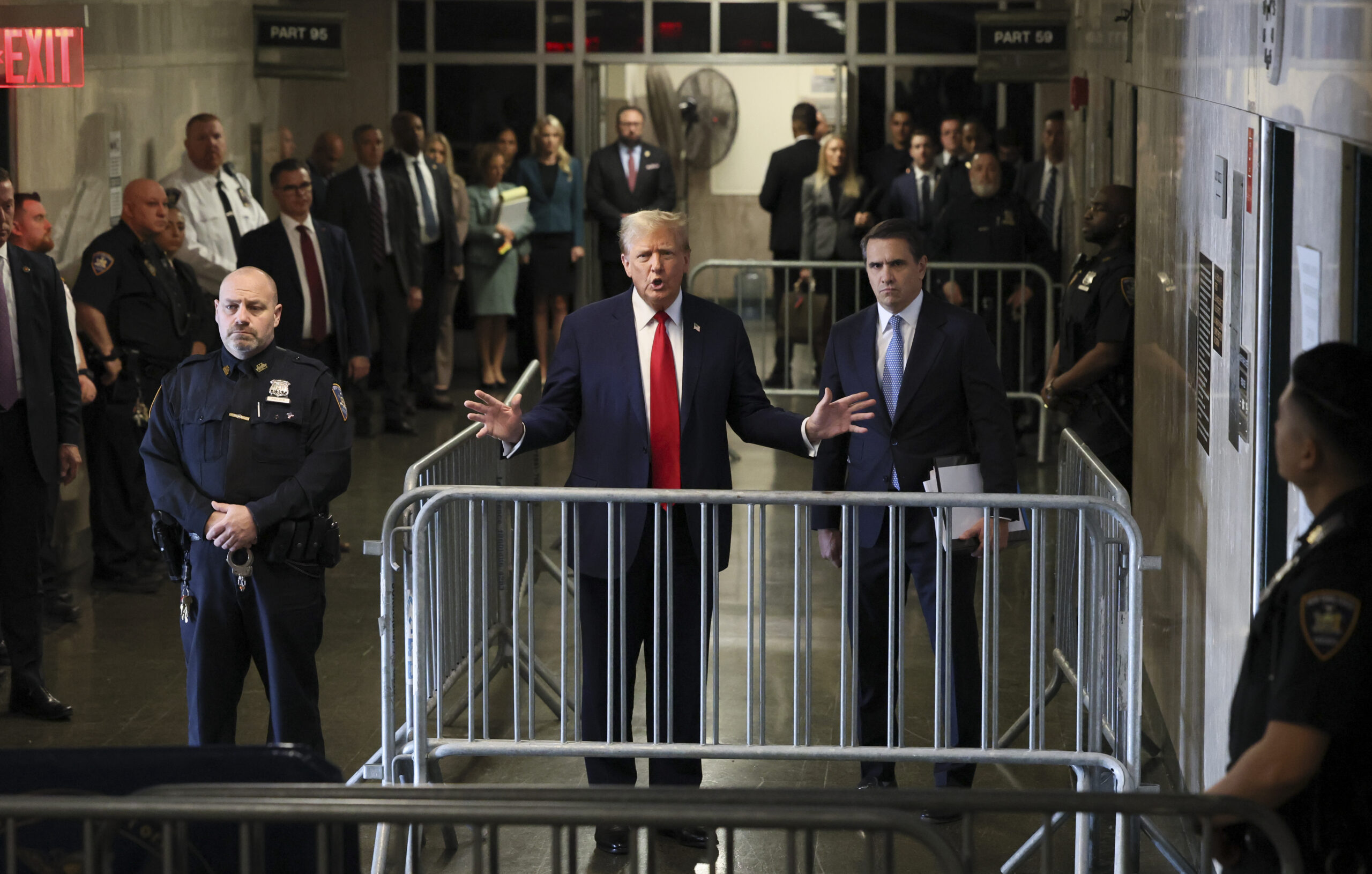 Republican presidential candidate and former President Donald Trump talks to reporters at Manhattan state court in New York, Monday, April 23, 2024.