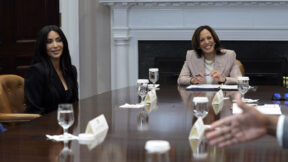 Vice President Kamala Harris, right, and Kim Kardashian, left, listen during a discussion in the Roosevelt Room of the White House in Washington, Thursday, April 25, 2024, on criminal justice reform and the pardons issued by President Joe Biden earlier this month.