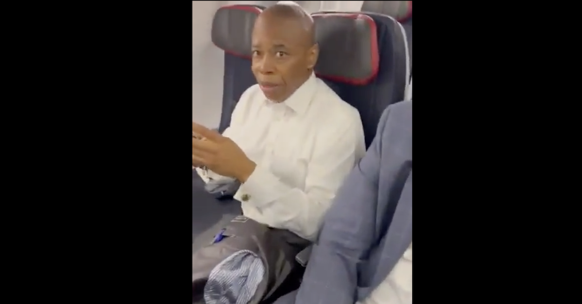 Eric Adams Confronted By Protester on Plane