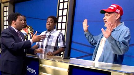 MAGA Melts Down Over Trump Fan Scared Of Black Host's Handshake In Tom Hanks SNL50 Sketch