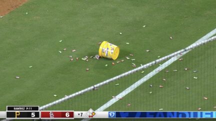 Wilson Contreras throws candy on the field following ejection