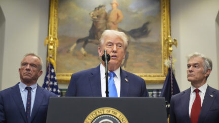 President Donald Trump speaks in the Roosevelt Room of the White House, Monday, Sept. 22, 2025, in Washington, as Health and Human Services Secretary Robert F. Kennedy Jr., left, and Centers for Medicare & Medicaid Services administrator Dr. Mehmet Oz listen.