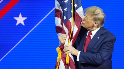 Trump being weird kissing flag